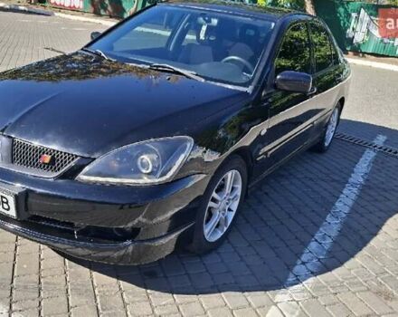 Чорний Міцубісі Lancer, об'ємом двигуна 2 л та пробігом 174 тис. км за 4800 $, фото 1 на Automoto.ua