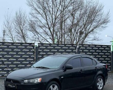 Черный Мицубиси Лансер, объемом двигателя 1.5 л и пробегом 245 тыс. км за 4499 $, фото 1 на Automoto.ua