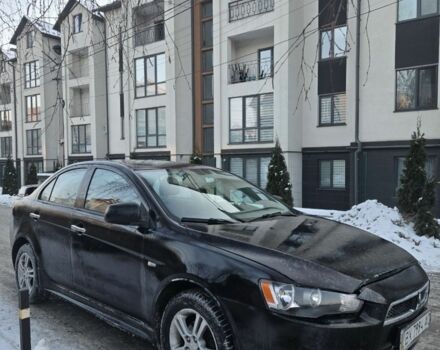 Черный Мицубиси Лансер, объемом двигателя 2 л и пробегом 250 тыс. км за 4200 $, фото 1 на Automoto.ua