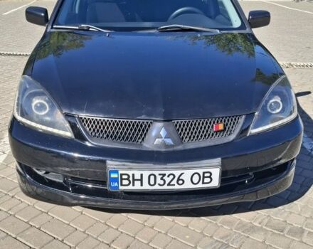 Чорний Міцубісі Lancer, об'ємом двигуна 2 л та пробігом 174 тис. км за 4800 $, фото 1 на Automoto.ua