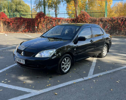 Чорний Міцубісі Lancer, об'ємом двигуна 1.58 л та пробігом 175 тис. км за 5200 $, фото 1 на Automoto.ua