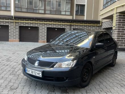 Чорний Міцубісі Lancer, об'ємом двигуна 0.16 л та пробігом 228 тис. км за 4650 $, фото 1 на Automoto.ua