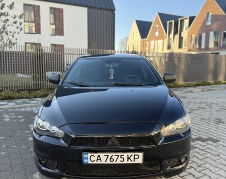 Черный Мицубиси Лансер, объемом двигателя 2 л и пробегом 285 тыс. км за 4800 $, фото 1 на Automoto.ua