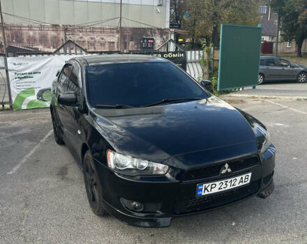 Чорний Міцубісі Lancer, об'ємом двигуна 2 л та пробігом 208 тис. км за 6500 $, фото 1 на Automoto.ua