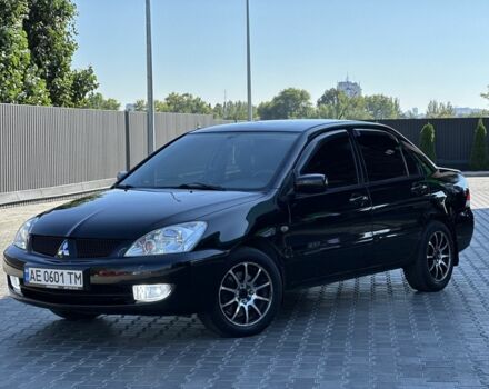 Чорний Міцубісі Lancer, об'ємом двигуна 1.6 л та пробігом 191 тис. км за 4899 $, фото 1 на Automoto.ua