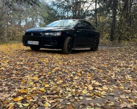 Черный Мицубиси Лансер, объемом двигателя 2 л и пробегом 270 тыс. км за 5500 $, фото 1 на Automoto.ua