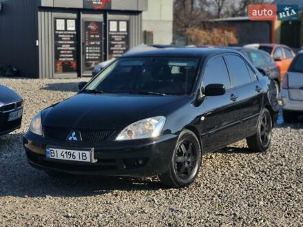 Мицубиси Лансер 2007 в Днепре (Днепропетровске) на Automoto.ua Черный Мицубиси Лансер, объемом двигателя 1.6 л и пробегом 176 тыс. км за 4800 $, фото 1 на Automoto.ua