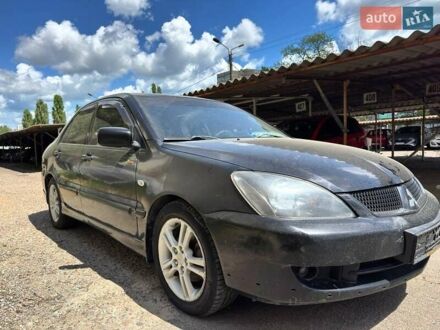 Міцубісі Lancer 2007 у Одесі на Automoto.ua Чорний Міцубісі Lancer, об'ємом двигуна 2 л та пробігом 286 тис. км за 3850 $, фото 1 на Automoto.ua