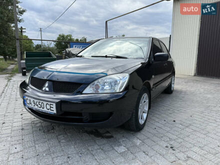 Мицубиси Лансер 2007 в Новом Буге на Automoto.ua Черный Мицубиси Лансер, объемом двигателя 1.58 л и пробегом 322 тыс. км за 4000 $, фото 1 на Automoto.ua