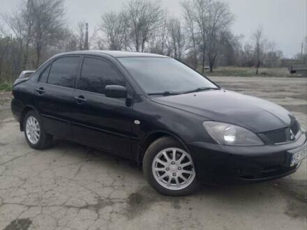 Мицубиси Лансер 2007 в Кривом Роге на Automoto.ua Черный Мицубиси Лансер, объемом двигателя 1.6 л и пробегом 310 тыс. км за 5700 $, фото 1 на Automoto.ua