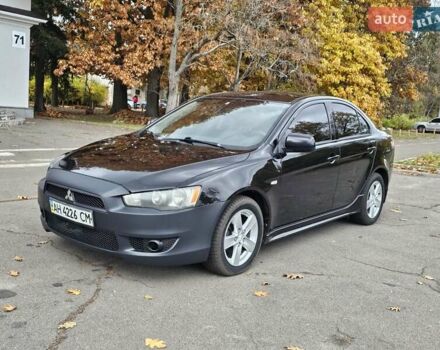 Чорний Міцубісі Lancer, об'ємом двигуна 2 л та пробігом 115 тис. км за 5000 $, фото 1 на Automoto.ua