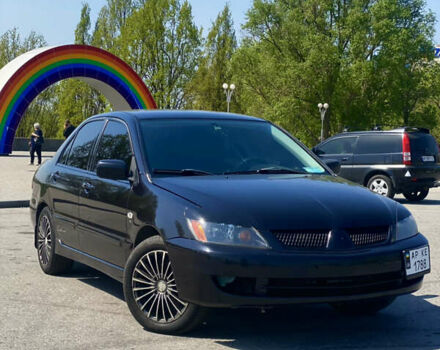 Чорний Міцубісі Lancer, об'ємом двигуна 1.58 л та пробігом 270 тис. км за 5390 $, фото 1 на Automoto.ua