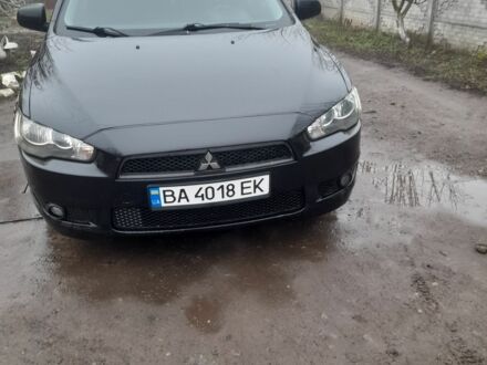 Чорний Міцубісі Lancer, об'ємом двигуна 2 л та пробігом 215 тис. км за 5700 $, фото 1 на Automoto.ua