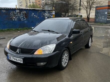 Черный Мицубиси Лансер, объемом двигателя 1.6 л и пробегом 342 тыс. км за 4100 $, фото 1 на Automoto.ua