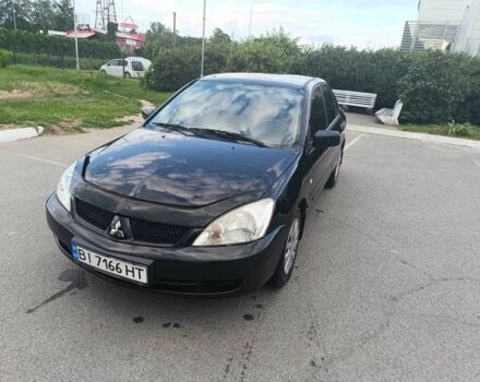 Чорний Міцубісі Lancer, об'ємом двигуна 1.6 л та пробігом 250 тис. км за 3100 $, фото 1 на Automoto.ua