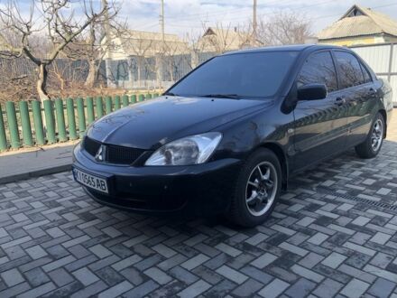 Мицубиси Лансер 2007 в Бородянке на Automoto.ua Черный Мицубиси Лансер, объемом двигателя 1.6 л и пробегом 283 тыс. км за 4600 $, фото 1 на Automoto.ua
