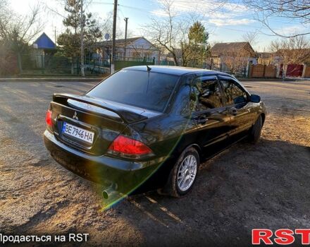 Черный Мицубиси Лансер, объемом двигателя 1.6 л и пробегом 0 тыс. км за 3600 $, фото 1 на Automoto.ua