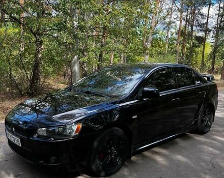 Чорний Міцубісі Lancer, об'ємом двигуна 2 л та пробігом 247 тис. км за 7300 $, фото 1 на Automoto.ua