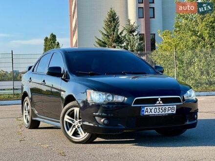 Чорний Міцубісі Lancer, об'ємом двигуна 2 л та пробігом 260 тис. км за 5900 $, фото 1 на Automoto.ua