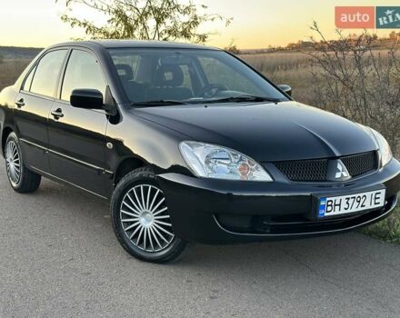 Чорний Міцубісі Lancer, об'ємом двигуна 1.58 л та пробігом 139 тис. км за 5200 $, фото 1 на Automoto.ua