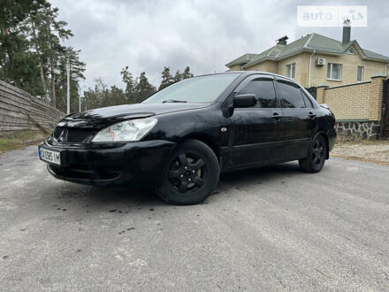 Чорний Міцубісі Lancer, об'ємом двигуна 1.6 л та пробігом 187 тис. км за 3900 $, фото 1 на Automoto.ua