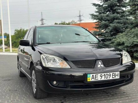 Чорний Міцубісі Lancer, об'ємом двигуна 1.6 л та пробігом 207 тис. км за 5600 $, фото 1 на Automoto.ua