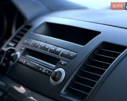 Черный Мицубиси Лансер, объемом двигателя 2 л и пробегом 205 тыс. км за 6500 $, фото 1 на Automoto.ua