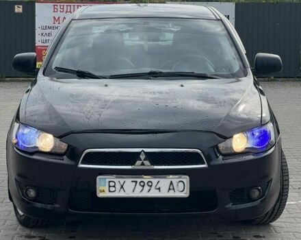 Черный Мицубиси Лансер, объемом двигателя 2 л и пробегом 350 тыс. км за 4299 $, фото 1 на Automoto.ua
