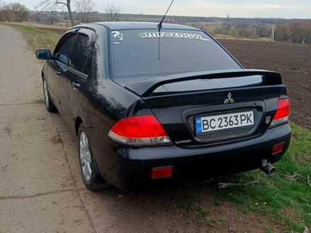 Мицубиси Лансер 2007 в Пятихатках на Automoto.ua Черный Мицубиси Лансер, объемом двигателя 1.6 л и пробегом 202 тыс. км за 4800 $, фото 1 на Automoto.ua