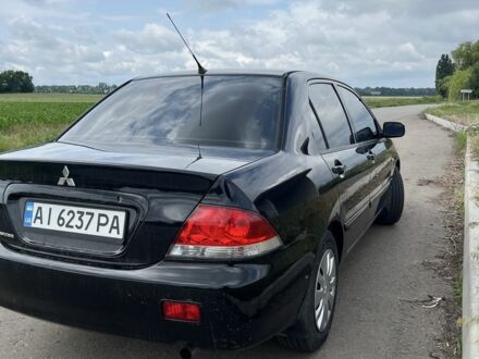 Мицубиси Лансер 2007 в Борисполе на Automoto.ua Черный Мицубиси Лансер, объемом двигателя 1.6 л и пробегом 3 тыс. км за 5900 $, фото 1 на Automoto.ua