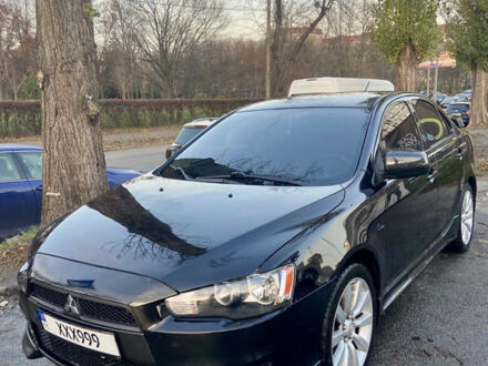 Чорний Міцубісі Lancer, об'ємом двигуна 2 л та пробігом 222 тис. км за 7500 $, фото 1 на Automoto.ua