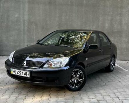 Чорний Міцубісі Lancer, об'ємом двигуна 1.58 л та пробігом 135 тис. км за 4100 $, фото 1 на Automoto.ua