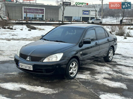 Чорний Міцубісі Lancer, об'ємом двигуна 1.6 л та пробігом 184 тис. км за 4300 $, фото 1 на Automoto.ua