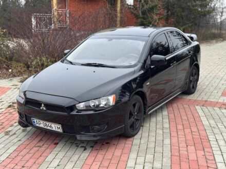 Черный Мицубиси Лансер, объемом двигателя 2 л и пробегом 217 тыс. км за 5500 $, фото 1 на Automoto.ua