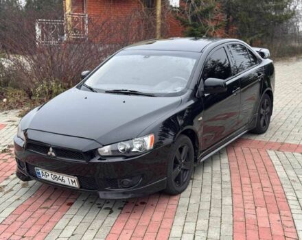 Черный Мицубиси Лансер, объемом двигателя 2 л и пробегом 217 тыс. км за 5500 $, фото 1 на Automoto.ua