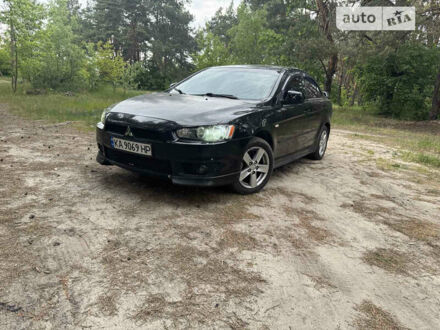 Чорний Міцубісі Lancer, об'ємом двигуна 2 л та пробігом 226 тис. км за 5450 $, фото 1 на Automoto.ua