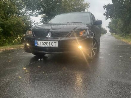 Чорний Міцубісі Lancer, об'ємом двигуна 1.6 л та пробігом 310 тис. км за 5100 $, фото 1 на Automoto.ua