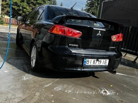 Чорний Міцубісі Lancer, об'ємом двигуна 2 л та пробігом 225 тис. км за 5000 $, фото 1 на Automoto.ua