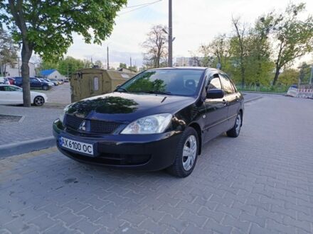 Чорний Міцубісі Lancer, об'ємом двигуна 1.6 л та пробігом 276 тис. км за 4099 $, фото 1 на Automoto.ua