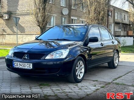 Міцубісі Lancer 2007 у Новом Буге на Automoto.ua Чорний Міцубісі Lancer, об'ємом двигуна 1.6 л та пробігом 224 тис. км за 4000 $, фото 1 на Automoto.ua