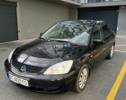 Чорний Міцубісі Lancer, об'ємом двигуна 1.6 л та пробігом 173 тис. км за 3250 $, фото 1 на Automoto.ua