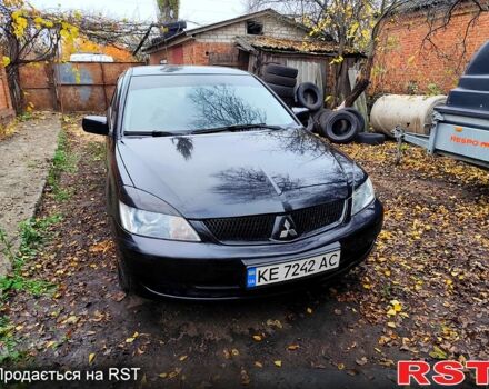 Черный Мицубиси Лансер, объемом двигателя 1.6 л и пробегом 171 тыс. км за 4350 $, фото 1 на Automoto.ua