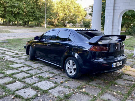 Чорний Міцубісі Lancer, об'ємом двигуна 2 л та пробігом 280 тис. км за 5200 $, фото 1 на Automoto.ua