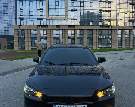 Черный Мицубиси Лансер, объемом двигателя 2 л и пробегом 245 тыс. км за 6200 $, фото 1 на Automoto.ua