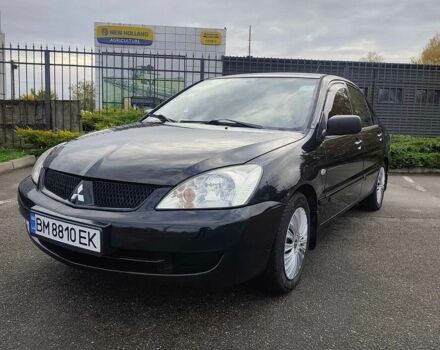 Чорний Міцубісі Lancer, об'ємом двигуна 1.58 л та пробігом 202 тис. км за 4700 $, фото 1 на Automoto.ua