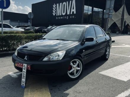 Чорний Міцубісі Lancer, об'ємом двигуна 1.6 л та пробігом 228 тис. км за 3300 $, фото 1 на Automoto.ua