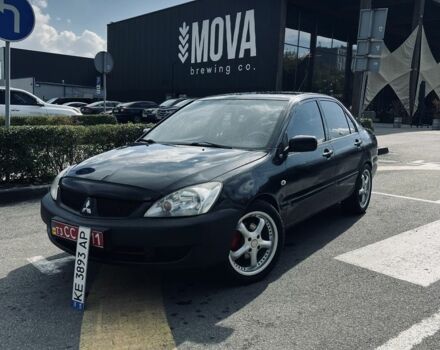 Чорний Міцубісі Lancer, об'ємом двигуна 1.6 л та пробігом 228 тис. км за 3600 $, фото 1 на Automoto.ua