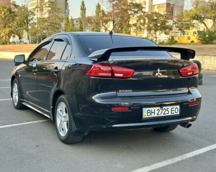 Чорний Міцубісі Lancer, об'ємом двигуна 2 л та пробігом 250 тис. км за 5400 $, фото 1 на Automoto.ua