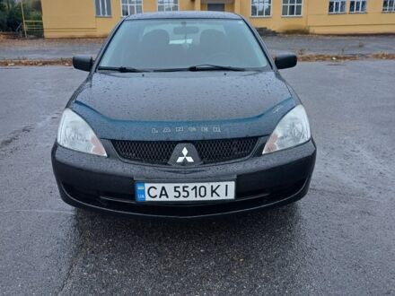 Міцубісі Lancer 2007 у Шполе на Automoto.ua Чорний Міцубісі Lancer, об'ємом двигуна 1.6 л та пробігом 265 тис. км за 4650 $, фото 1 на Automoto.ua