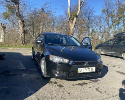 Черный Мицубиси Лансер, объемом двигателя 2 л и пробегом 372 тыс. км за 6200 $, фото 1 на Automoto.ua